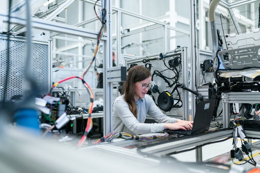 Factory worker on an industrial production line